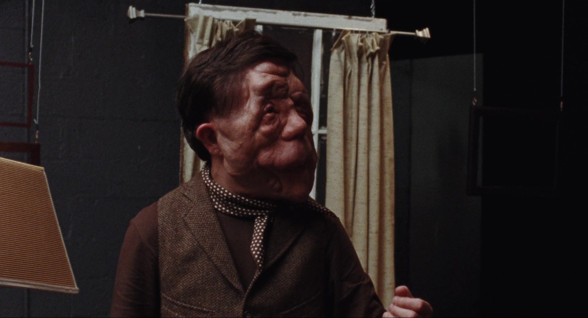 A Different Man (2024), wide, 1.85:1 — film still