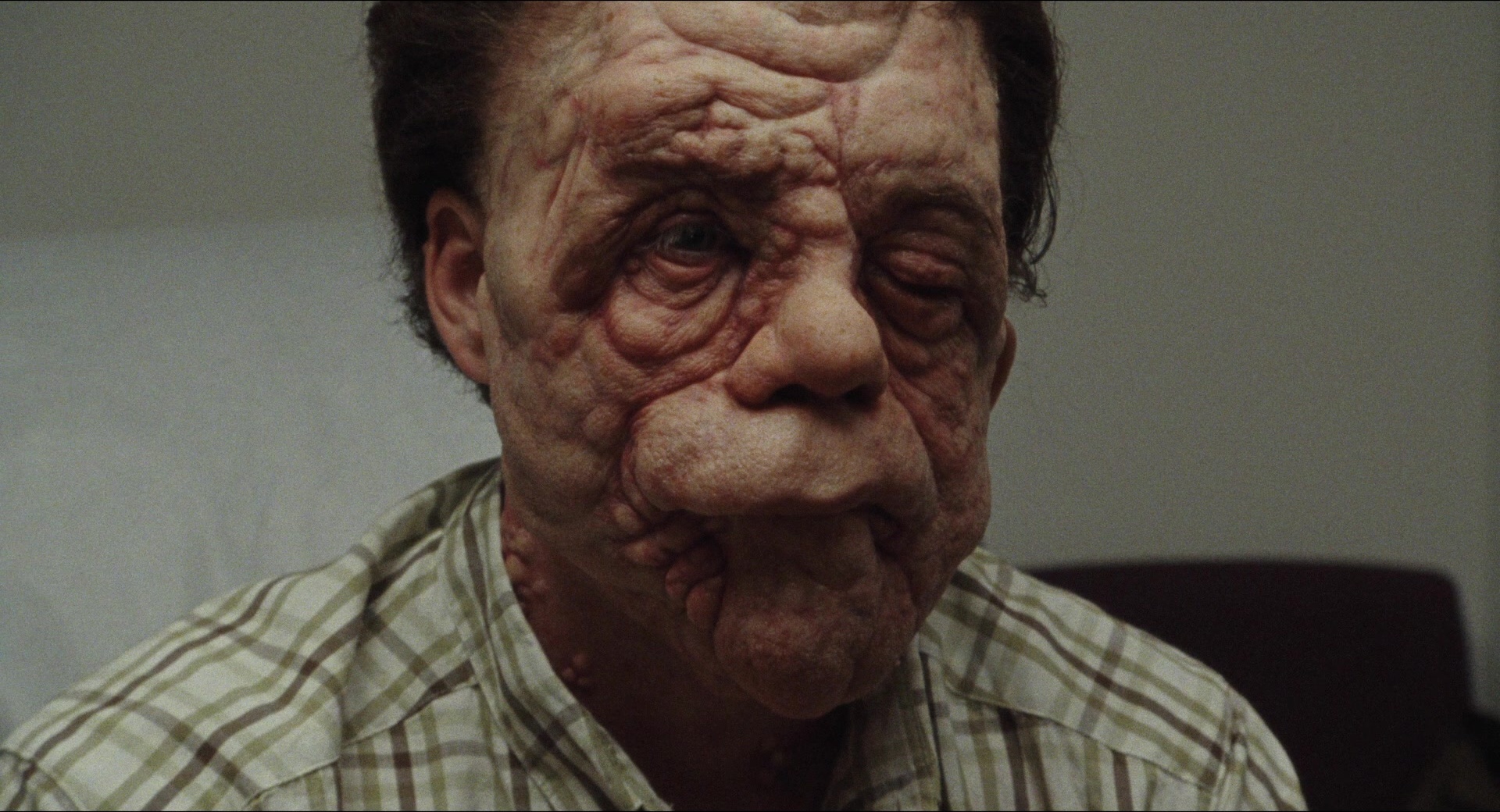 A Different Man (2024), wide, 1.85:1 — film still