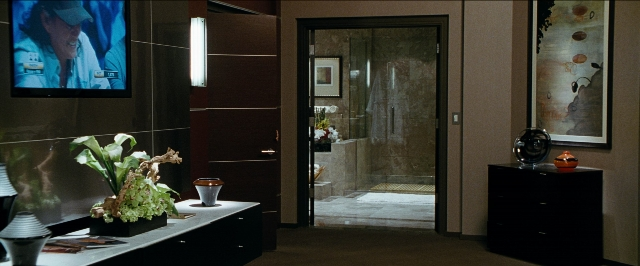 Wide shot frame from The Hangover — room, table, door
