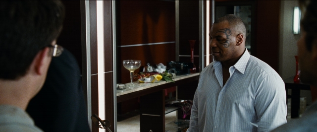 Wide shot frame from The Hangover — standing, room, shirt