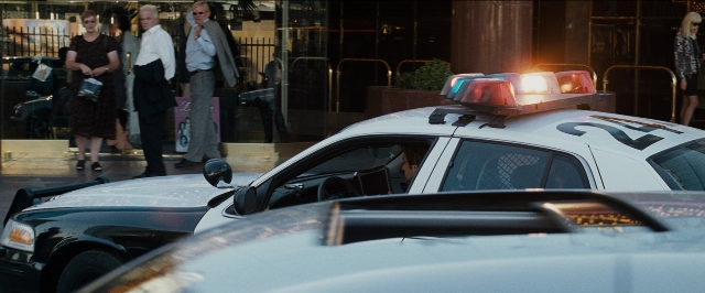 Wide shot frame from The Hangover — standing, street, car