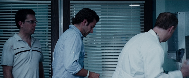 Wide shot frame from The Hangover — standing, room, dialogue