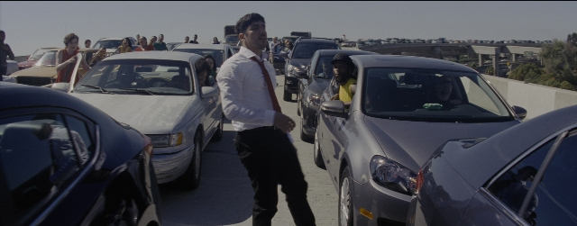 Wide shot frame from La La Land — sitting, standing, walking