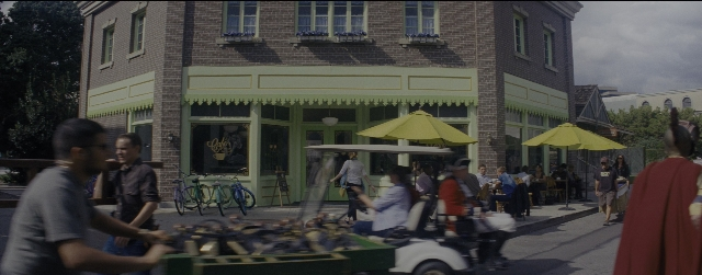 Wide shot frame from La La Land — sitting, standing, walking
