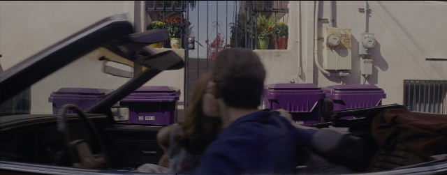 Frame from La La Land — sitting, street, car