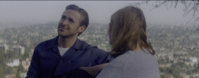 Wide shot frame from La La Land — sitting, shirt, beard