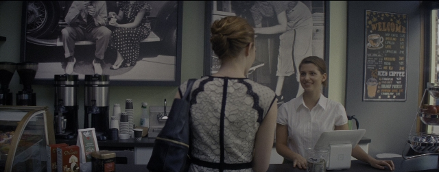 Wide shot frame from La La Land — standing, dress, shirt