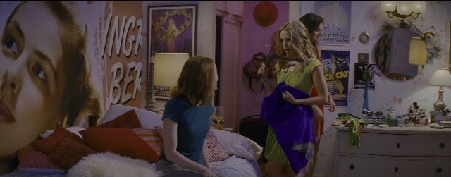 Wide shot frame from La La Land — sitting, standing, room