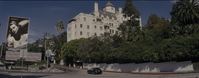 Wide shot frame from La La Land — street, face, person
