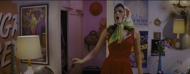 Wide shot frame from La La Land — standing, room, dress
