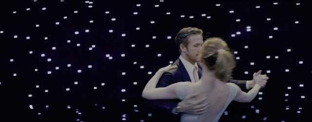 Frame from La La Land — suit, night, dress