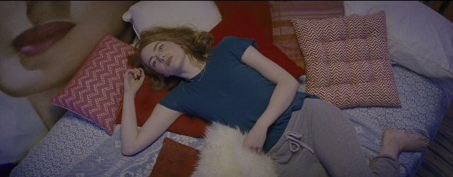 Wide shot frame from La La Land — bed, shirt, bedroom
