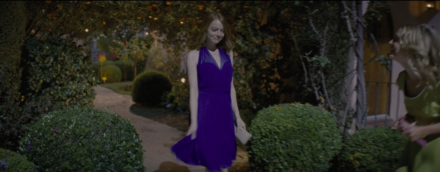 Wide shot frame from La La Land — walking, dialogue, night