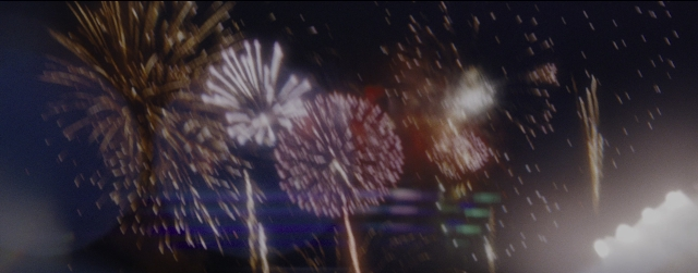 Wide shot frame from La La Land — night, smoke, person