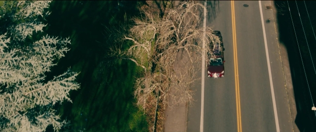Wide shot frame from To All the Boys I've Loved Before — street, car, land vehicle