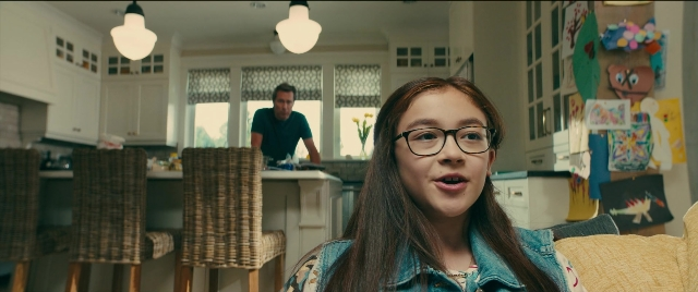 Medium shot frame from To All the Boys I've Loved Before — sitting, standing, room
