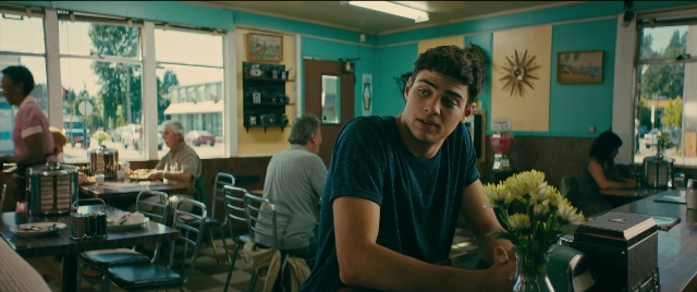Medium shot frame from To All the Boys I've Loved Before — sitting, table, house
