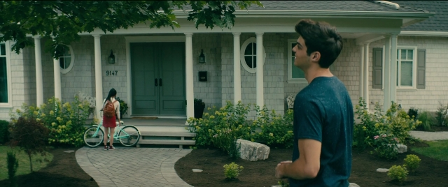 Wide shot frame from To All the Boys I've Loved Before — standing, door, house