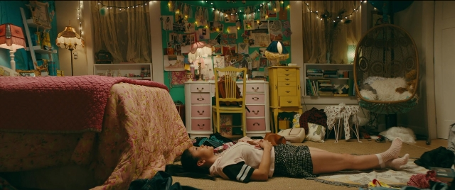 Wide shot frame from To All the Boys I've Loved Before — room, bed, mirror