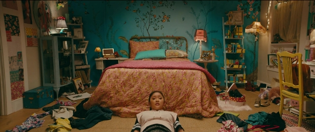 Wide shot frame from To All the Boys I've Loved Before — sitting, room, bed