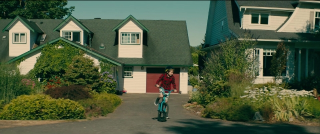 Wide shot frame from To All the Boys I've Loved Before — door, house, bicycle