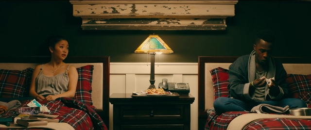 Medium shot frame from To All the Boys I've Loved Before — sitting, plate, room