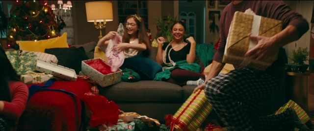 Wide shot frame from To All the Boys I've Loved Before — sitting, room, couch