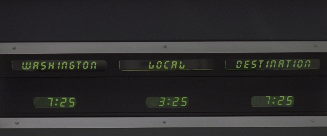 Frame from Air Force One — clock, digital clock