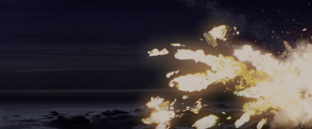 Frame from Air Force One — fire, night, water