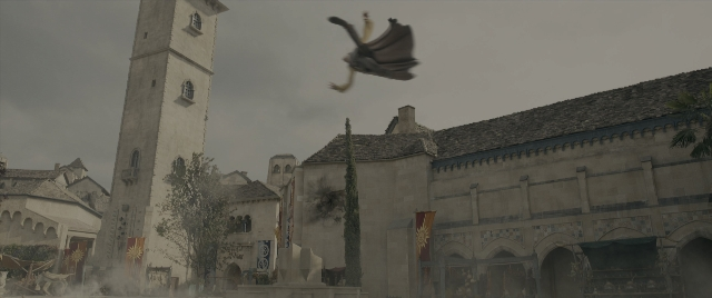 Wide shot frame from Dungeons & Dragons: Honor Among Thieves — tower, face, clock