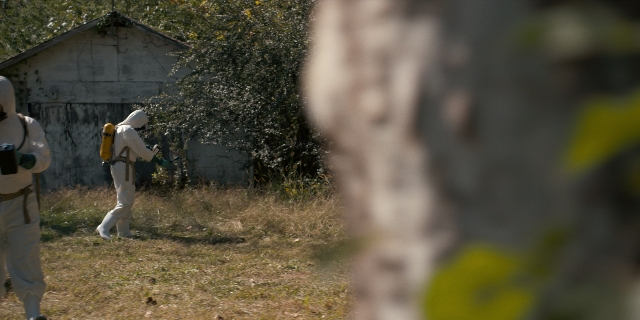 Wide shot frame from Stranger Things — walking, person