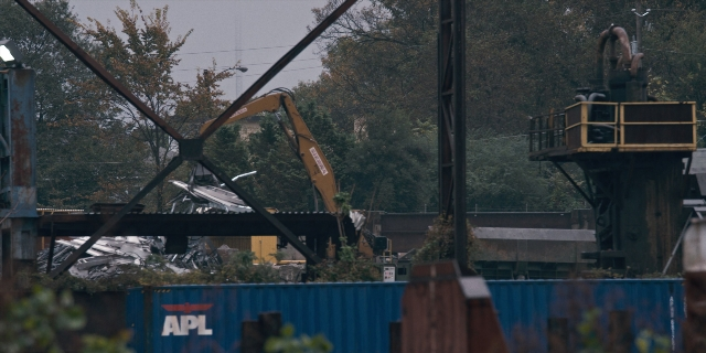 Wide shot frame from Stranger Things — land vehicle
