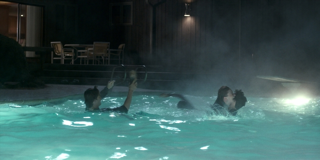 Frame from Stranger Things — table, night, water