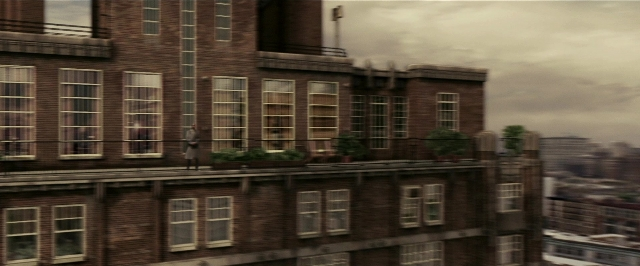 Wide shot frame from Lucky Number Slevin — standing, bird, person