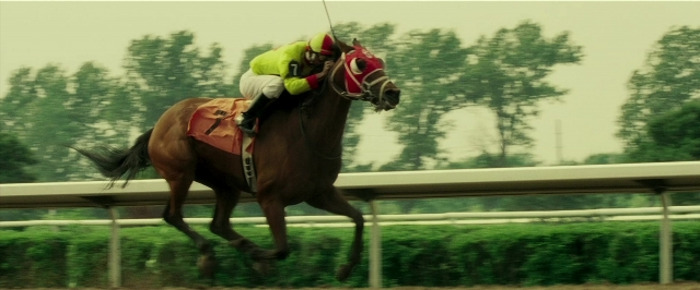 Wide shot frame from Lucky Number Slevin — hat, uniform, hand