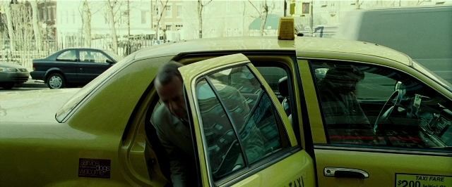 Frame from Lucky Number Slevin — door, street, car