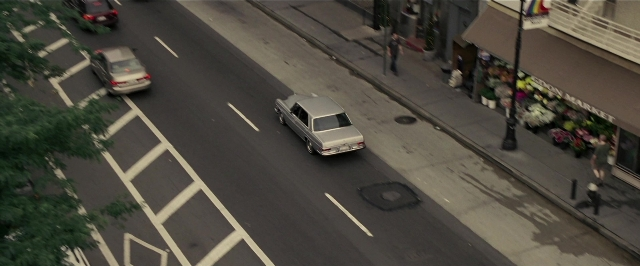Frame from Lucky Number Slevin — walking, street, car