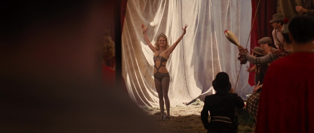Wide shot frame from Water for Elephants — standing, room, face