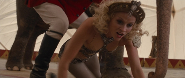 Medium shot frame from Water for Elephants — standing, hair, person