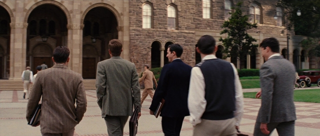 Wide shot frame from Water for Elephants — walking, dialogue, car