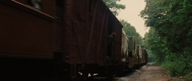 Wide shot frame from Water for Elephants — car, train