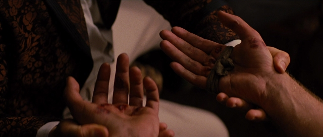 Wide shot frame from Water for Elephants — room, shirt, person