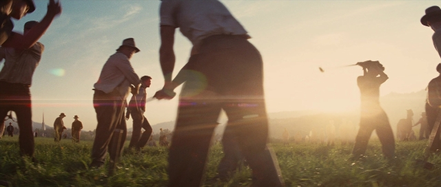 Wide shot frame from Water for Elephants — standing, shirt, person