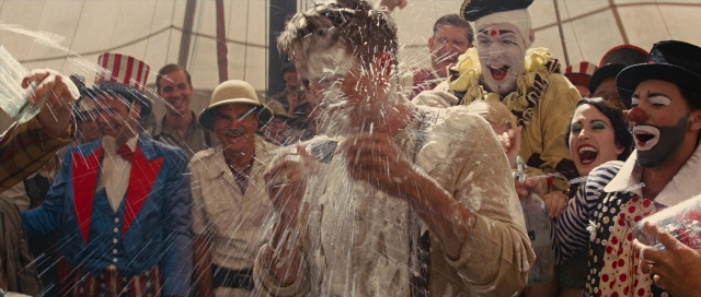 Wide shot frame from Water for Elephants — shirt, water, face