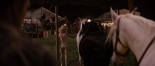Wide shot frame from Water for Elephants — standing, walking, night