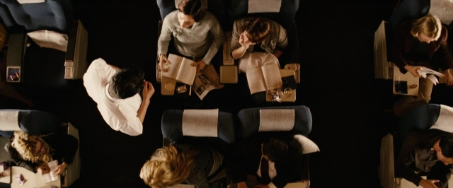 Wide shot frame from Thank You for Smoking — sitting, room, bird