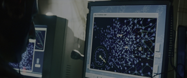 Wide shot frame from Everything Everywhere All at Once — sitting, office, clock