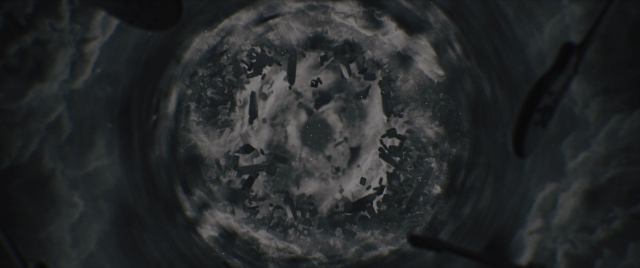 Wide shot frame from Everything Everywhere All at Once — standing, car tire