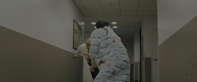 Wide shot frame from Everything Everywhere All at Once — walking, door, shirt