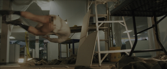 Wide shot frame from Everything Everywhere All at Once — shirt, ladder, person